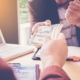 Image of a business person loaning money.